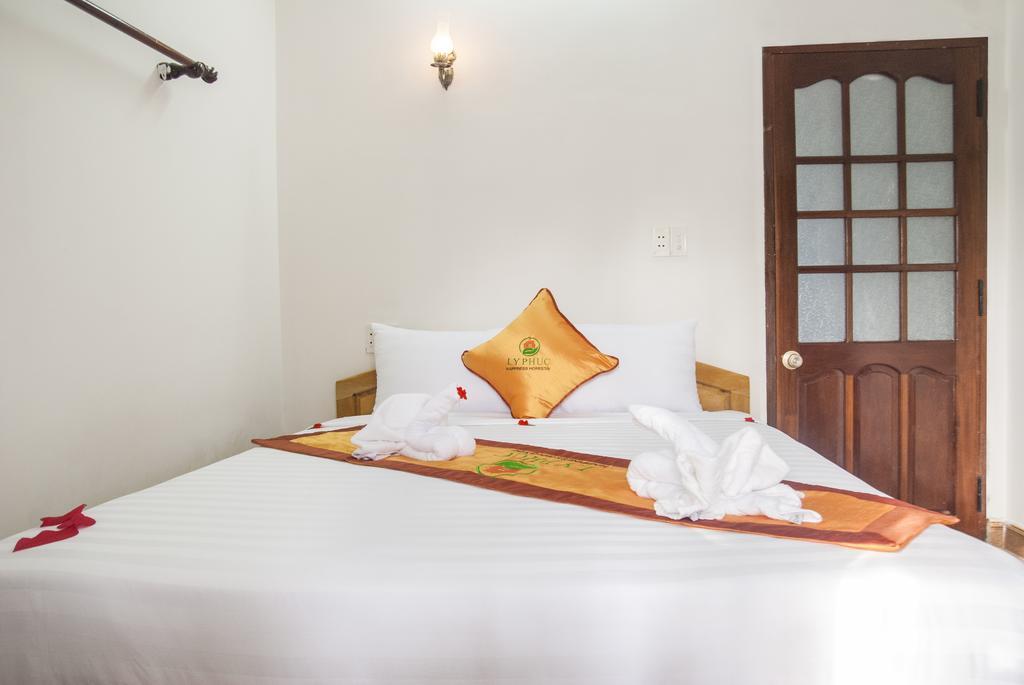 Ly Phuc Homestay Хойан Номер фото